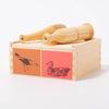 Quelle est Belle set of 2 wooden bird call places on a wooden box | © Conscious Craft